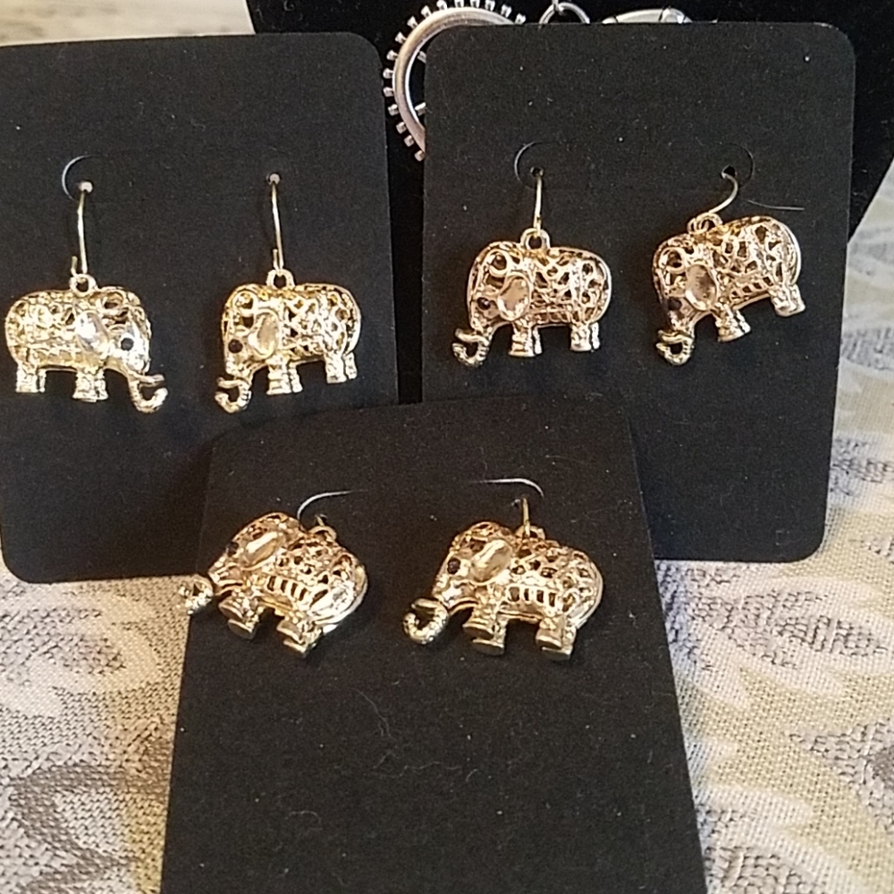 Gold elephant drop earrings